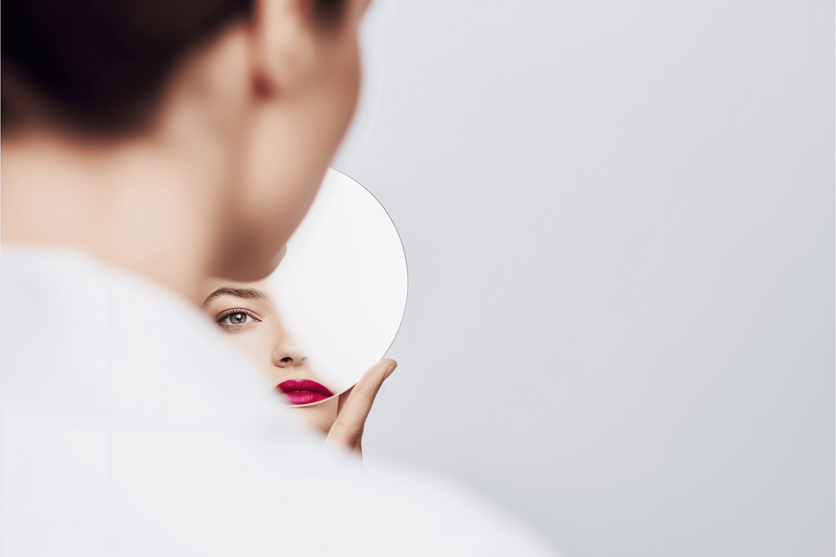 Professional makeup artist with client